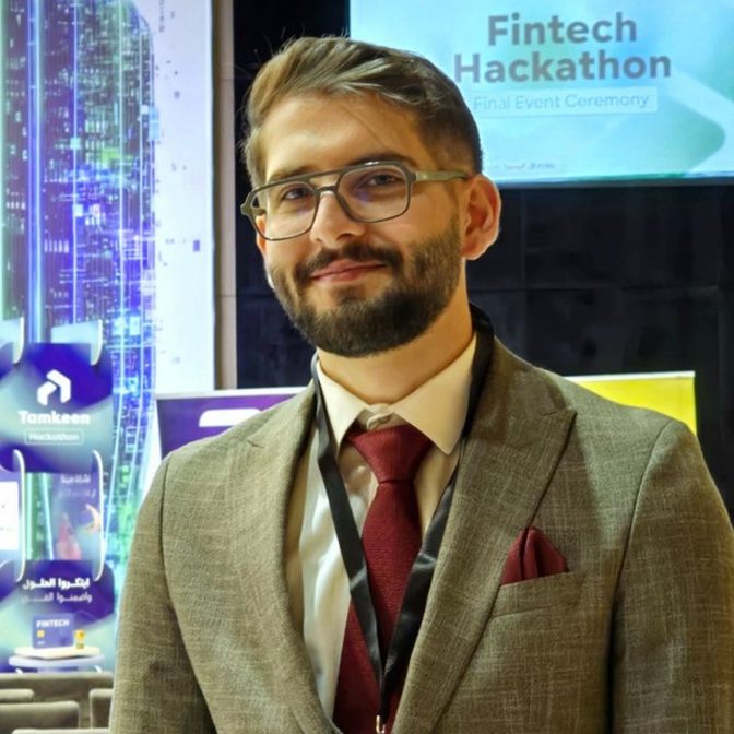 Portrait of Ahmed Imad Tarq at a fintech hackathon final ceremony